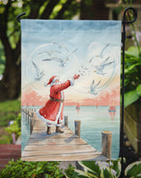 Santa Claus Feeding the Seagulls Christmas Garden Flag